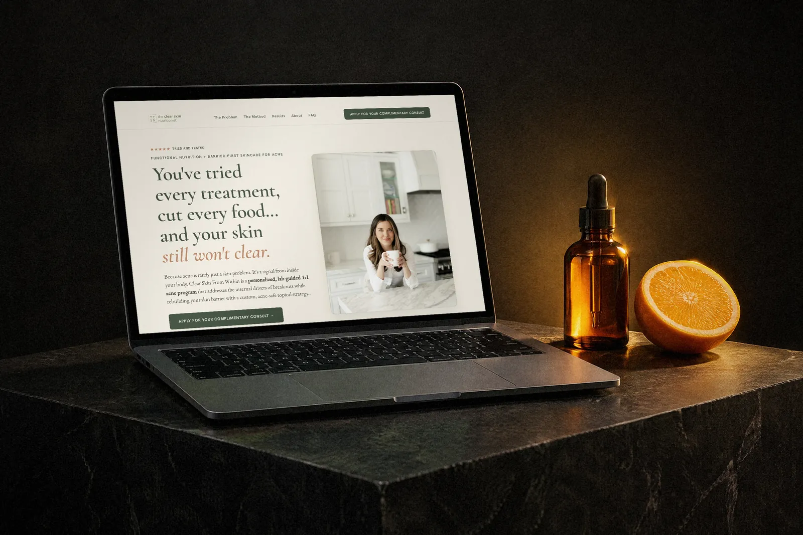 The Clear Skin Nutritionist application funnel shown on a laptop